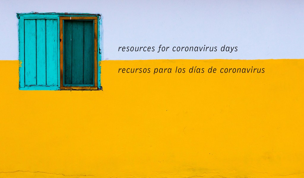 photograph of blue shuttered window in yellow and grey wall