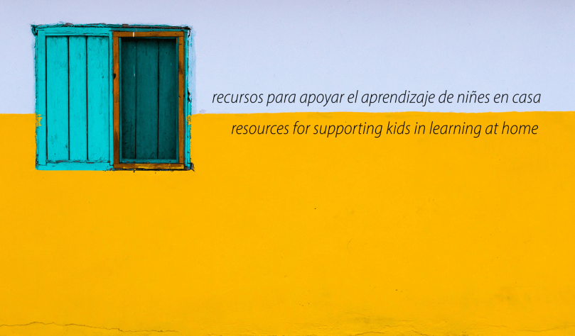 Blue-green shuttered window on yellow and grey wall with text